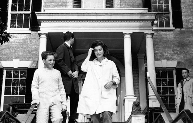 Jacqueline Kennedy leaves N Street home with Joseph Kennedy, Jr., and Attorney General Robert Kennedy in February 1964.
