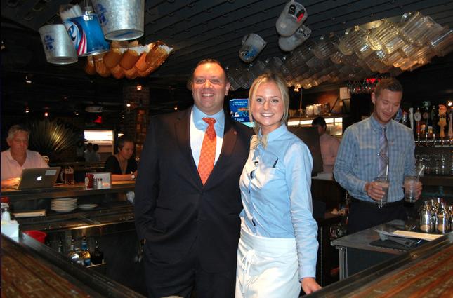 1789 Restaurant and Tombs general manager Rich Kaufman and Tombs bartender Sarah Dwinnell on re-opening day.